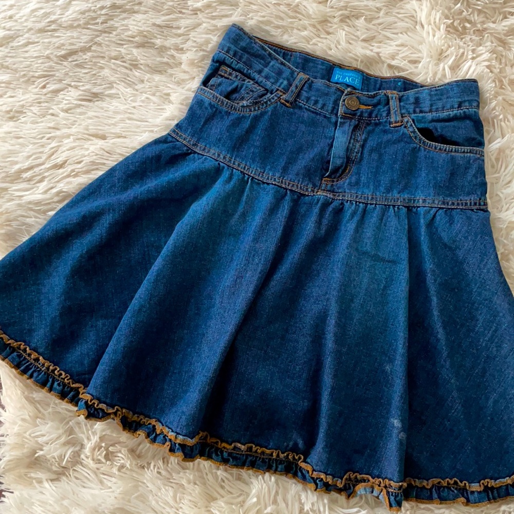 Girl’s denim skirt with ruffled bottom